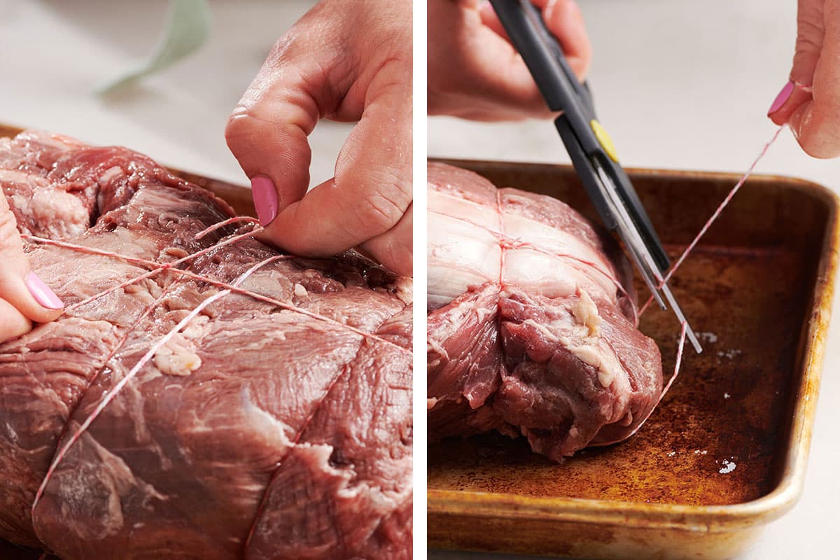 Tightening knot and cutting twine on trussed beef tenderloin.