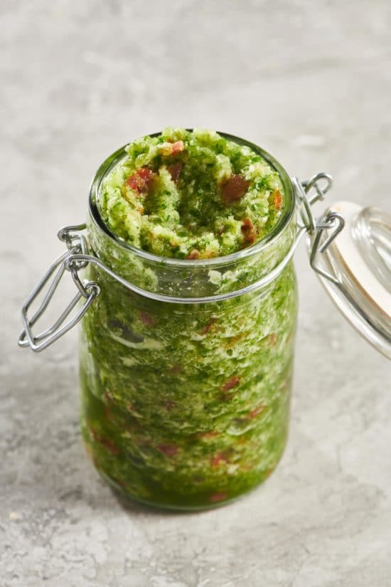 Glass jar filled to the top with Sofrito Sauce.