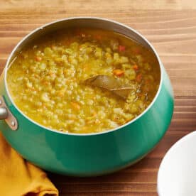 Vegetarian split pea soup in turquoise pot.