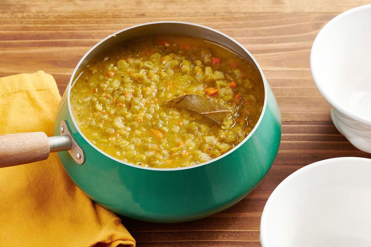 Vegetarian split pea soup in turquoise pot.