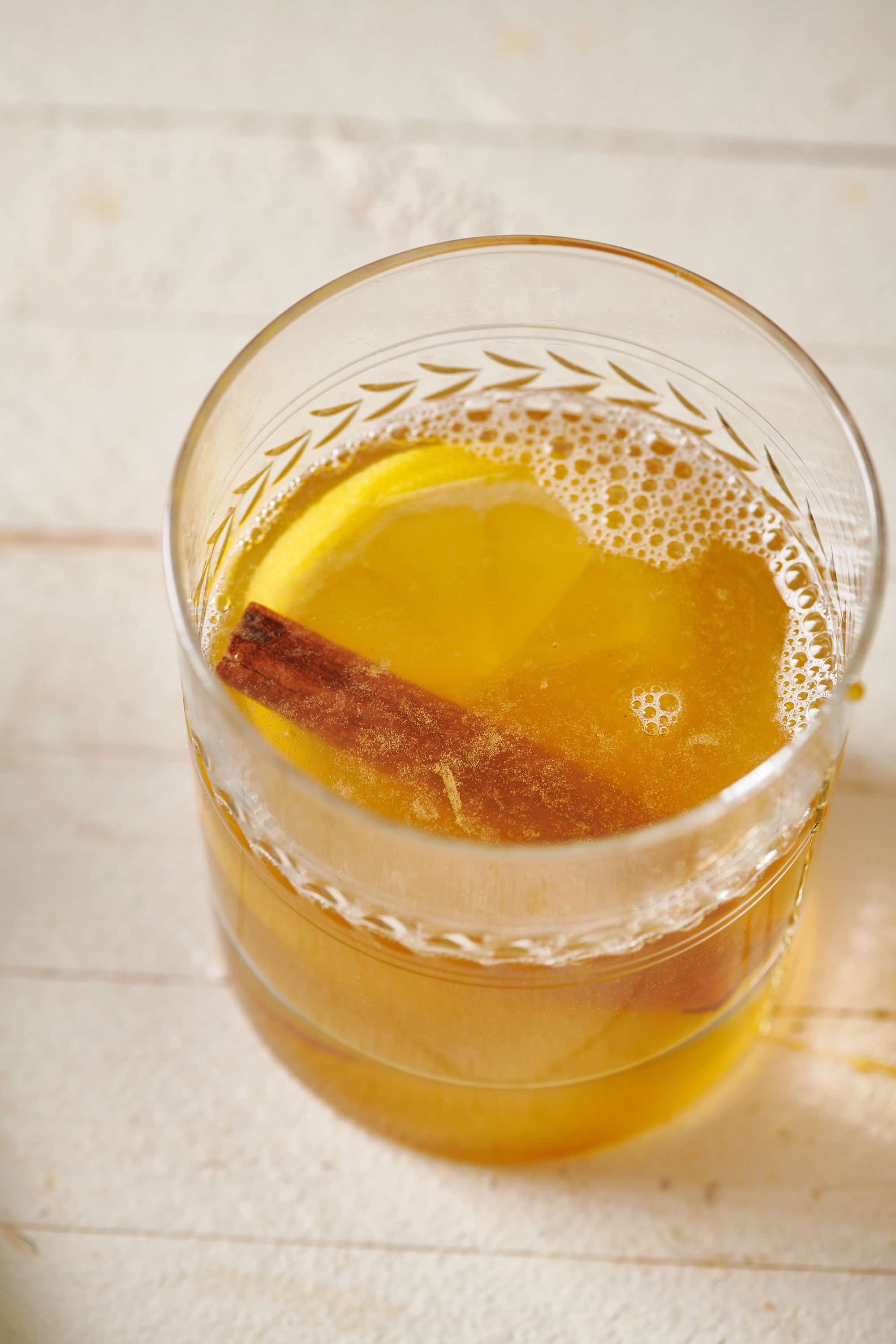 Cinnamon stick and lemon slice in a Hot Toddy.
