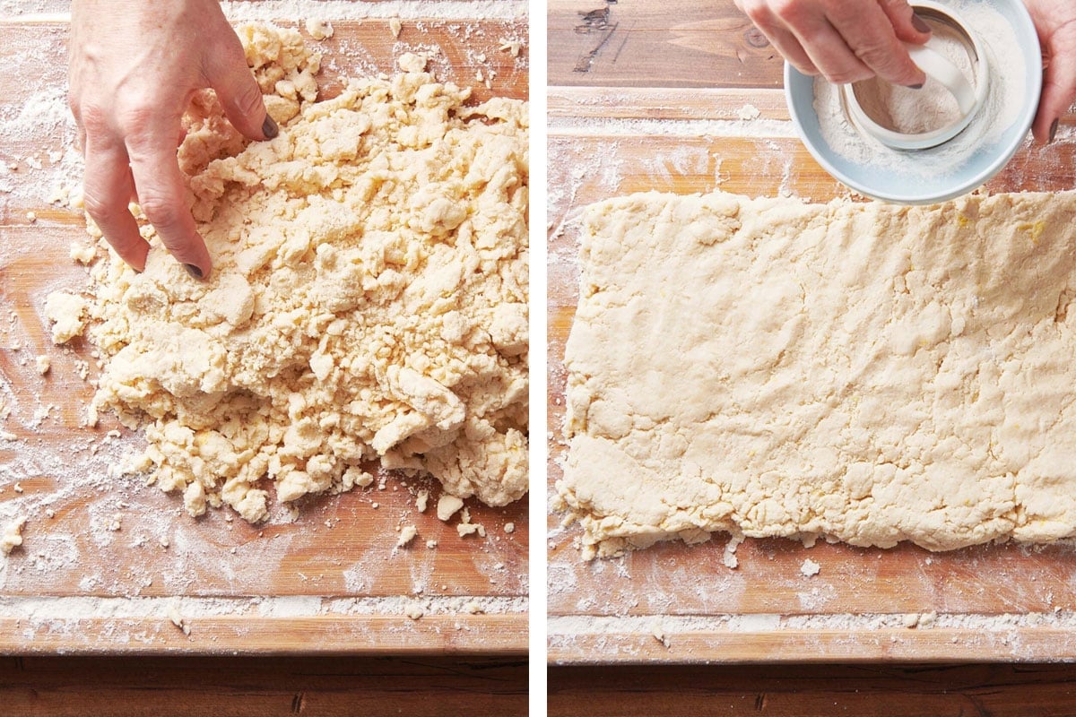 Rolling biscuit dough out onto a floured wooden board.