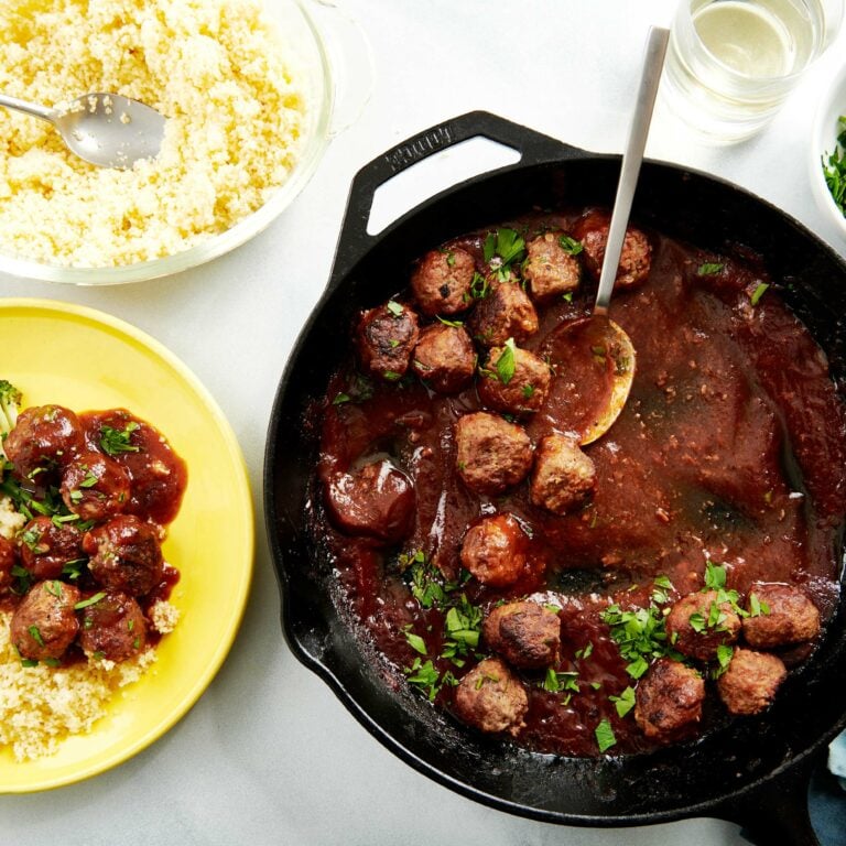 Skillet of Sweet and Sour Meatballs on a table.
