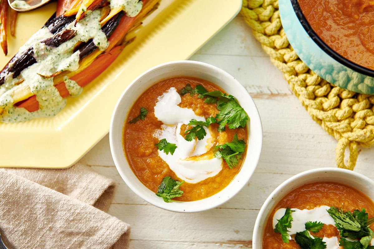 Moroccan Carrot and Cauliflower Soup in bowl on table.