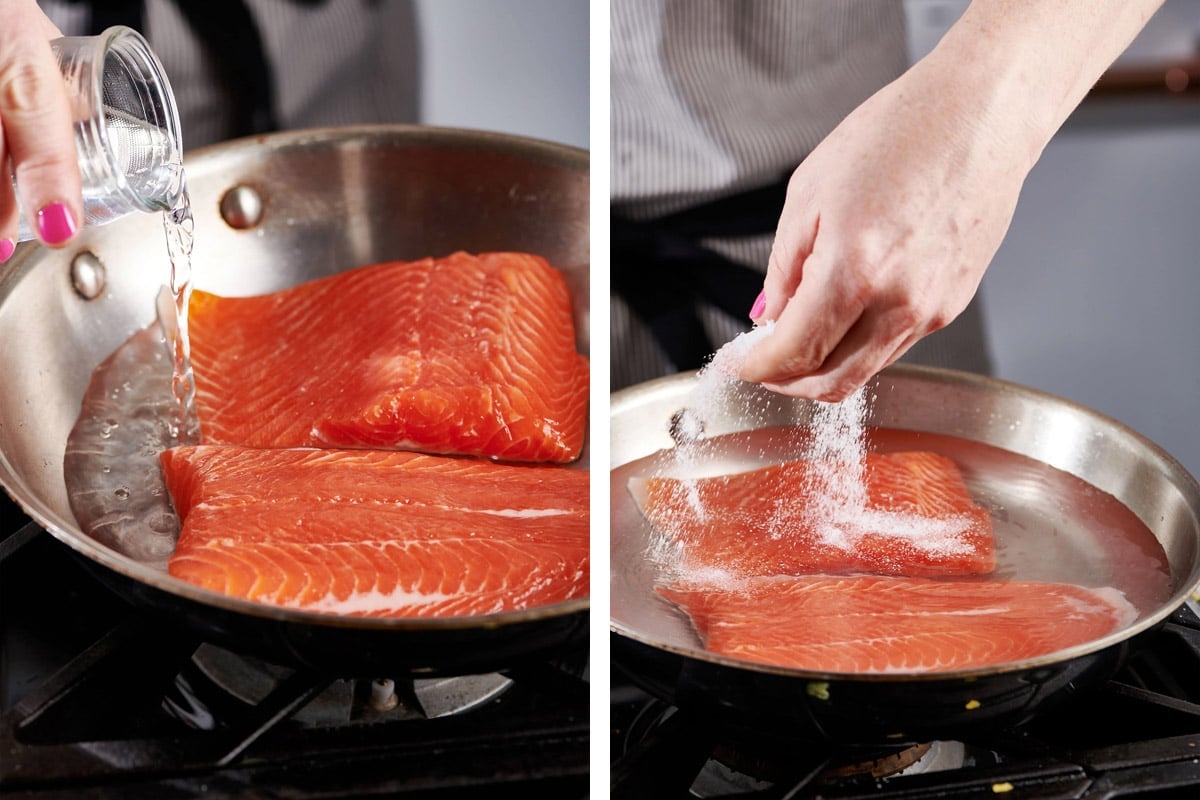 Woman pouring water into a skillet with salmon.