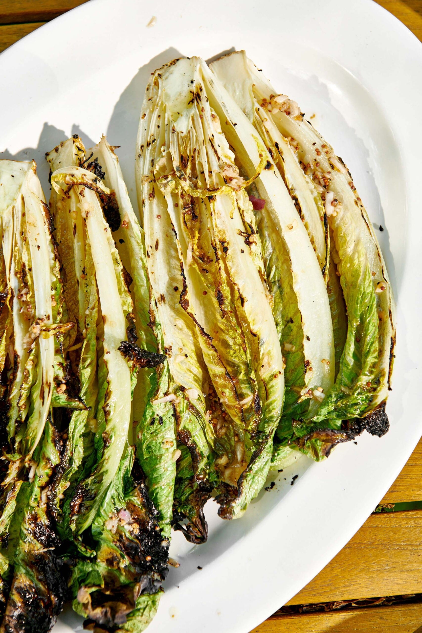 White plate of Grilled Romaine.