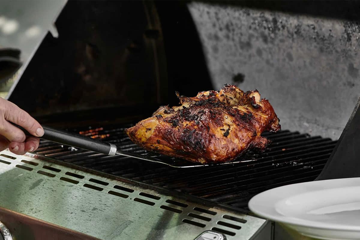 Split Turkey Breast on a grill.