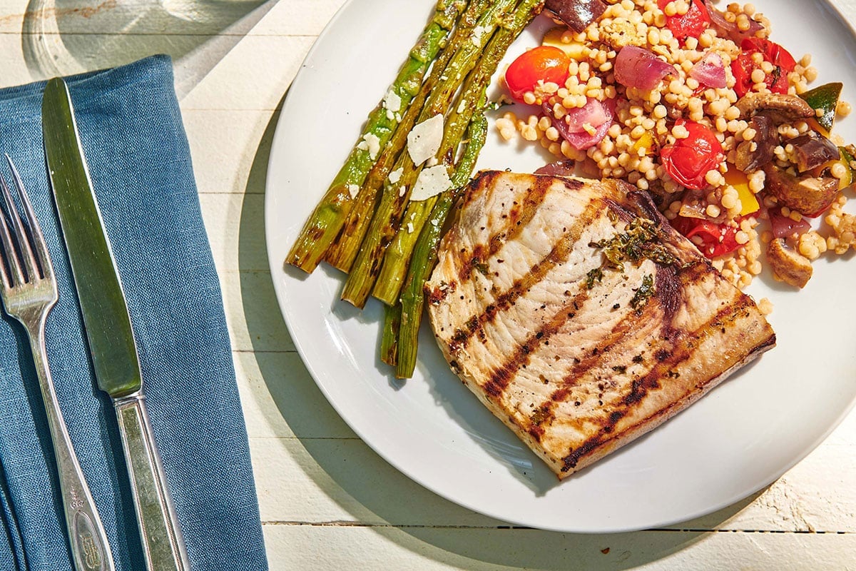 Grilled Swordfish on a white plate.
