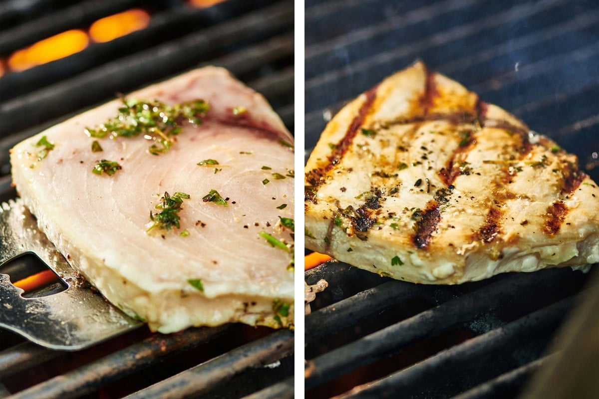 Spatula flipping Swordfish cooking on a grill.