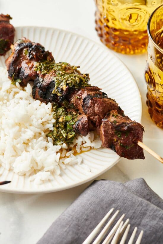Moroccan-Inspired Lamb Kebab on a plate with rice.