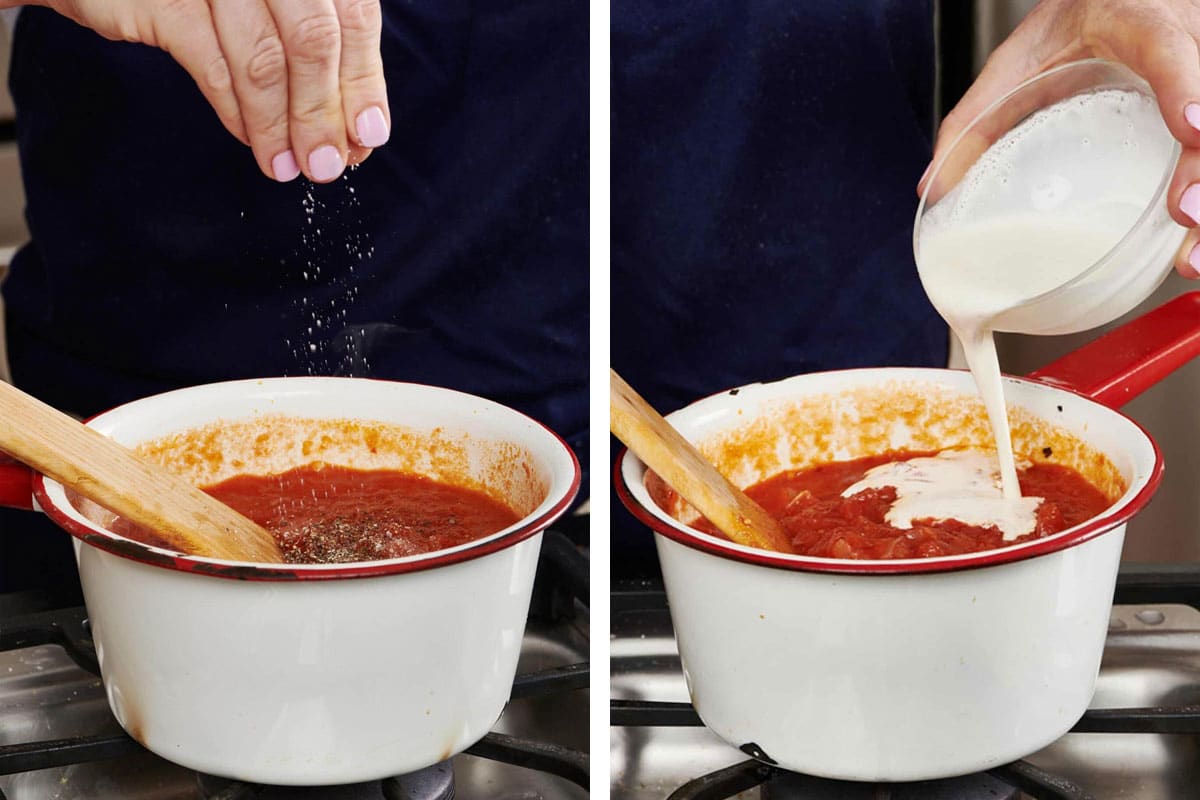 Woman sprinkling salt and pouring cream into a pot of tomato sauce.
