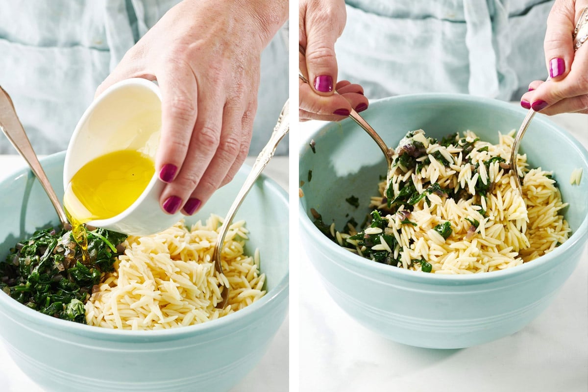 Woman dressing and tossing salad of orzo and spinach.