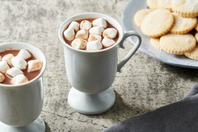 Marshmallows in a small mug of Hot Chocolate.
