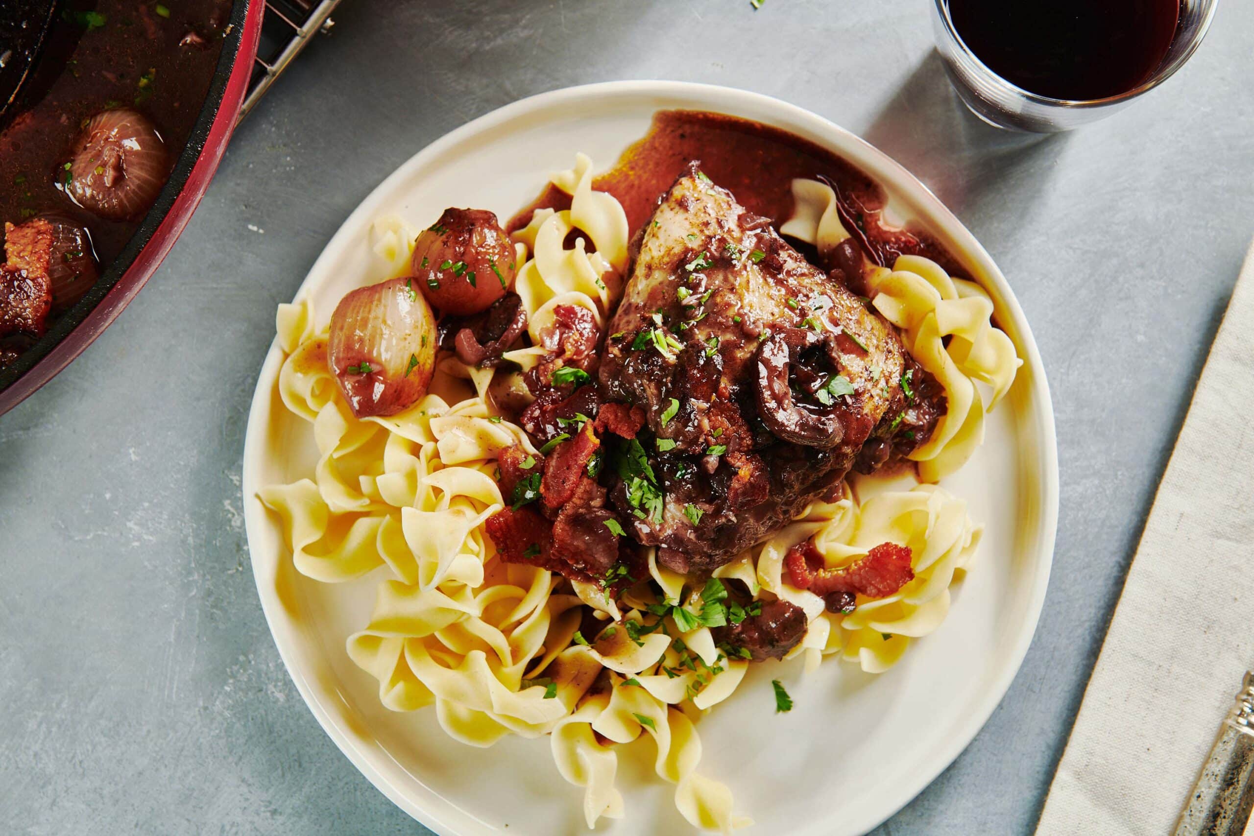 Coq au Vin on a white plate.