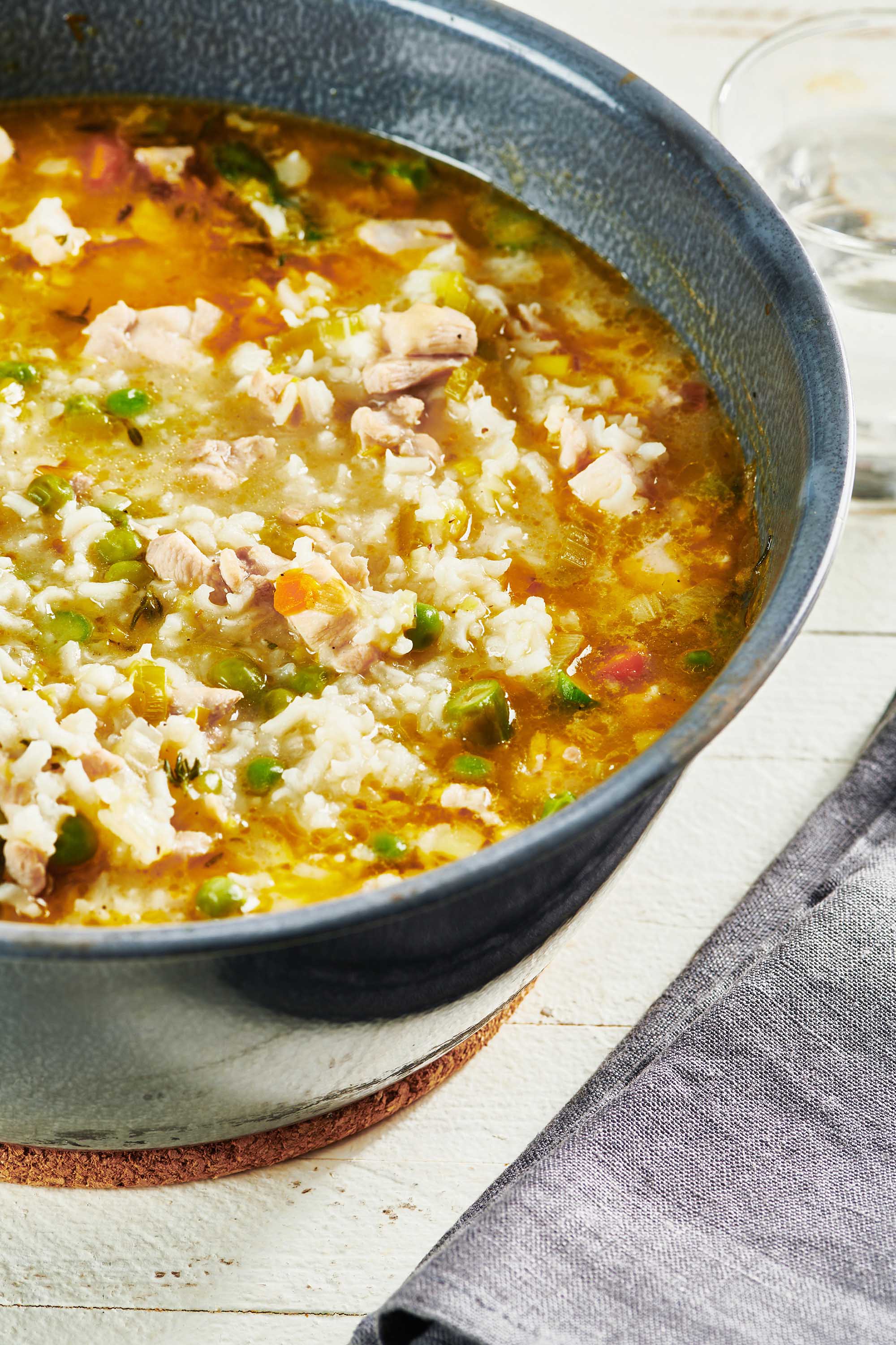 Blue bowl of Chicken and Rice Soup.