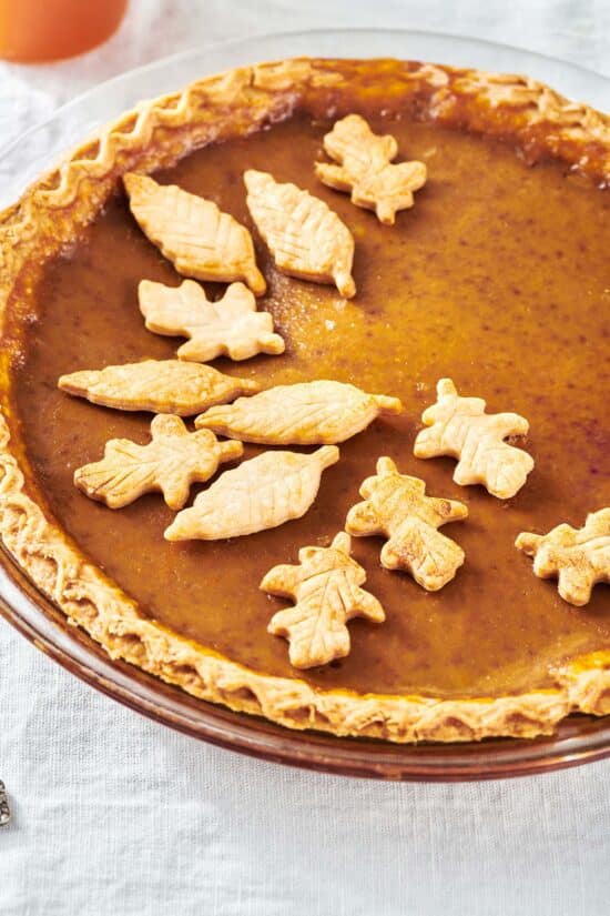 Pumpkin Pie decorated with pie crust leaves.
