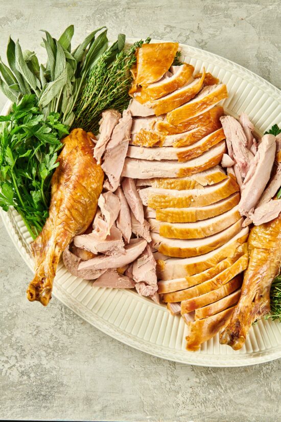 Carved turkey on a serving platter.