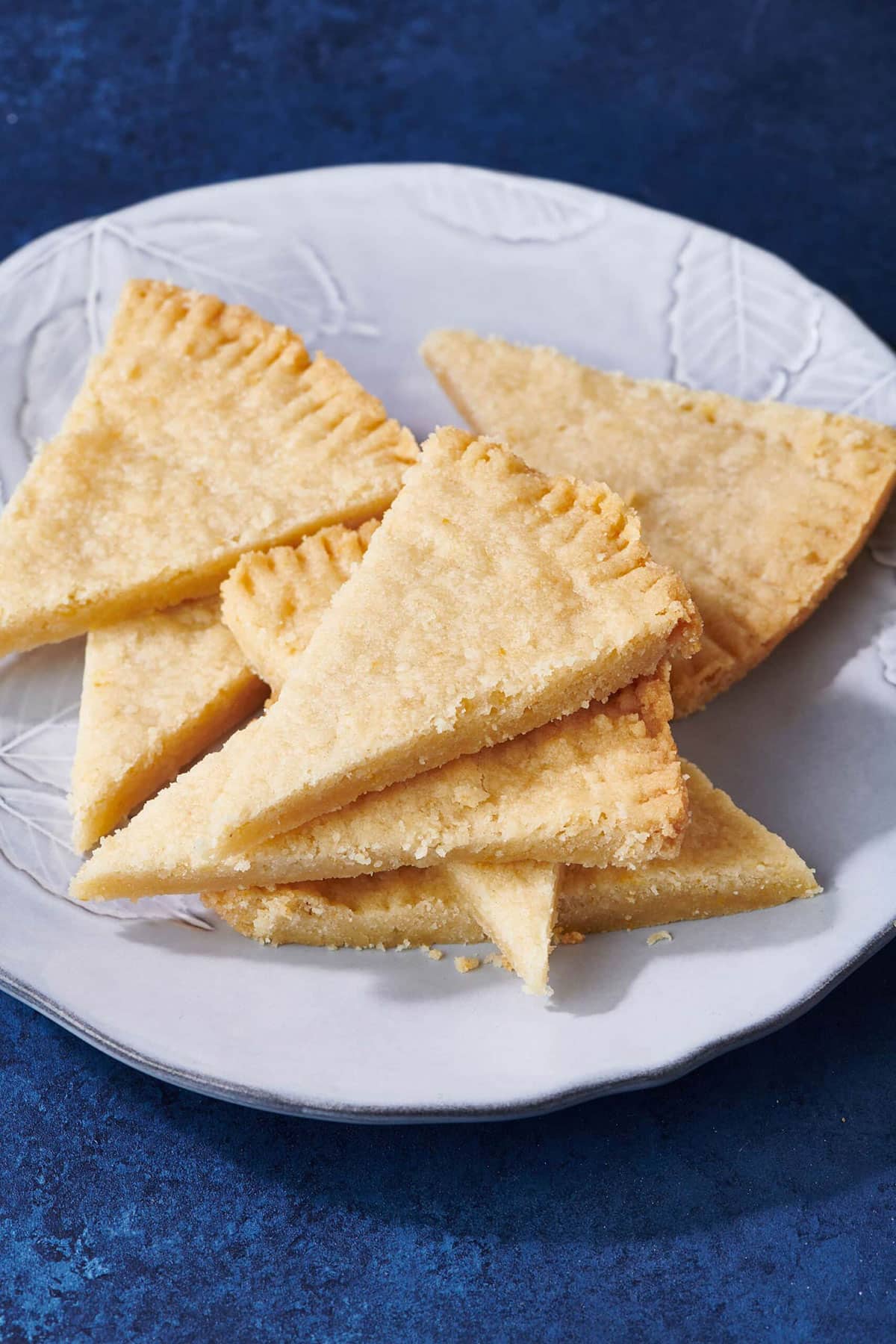 Shortbread Cookies piled on a plate.