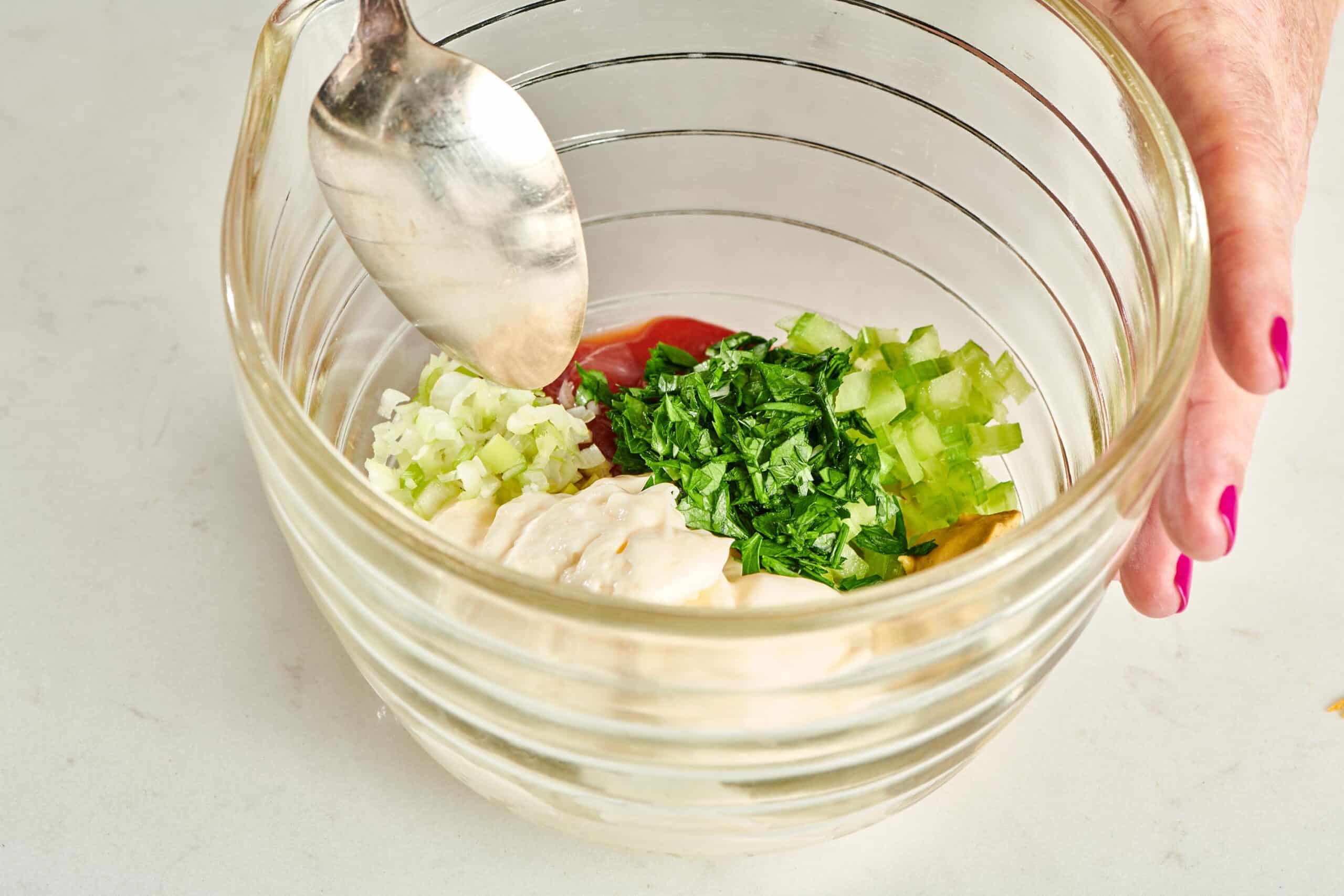 Remoulade Sauce ingredients in a glass bowl.