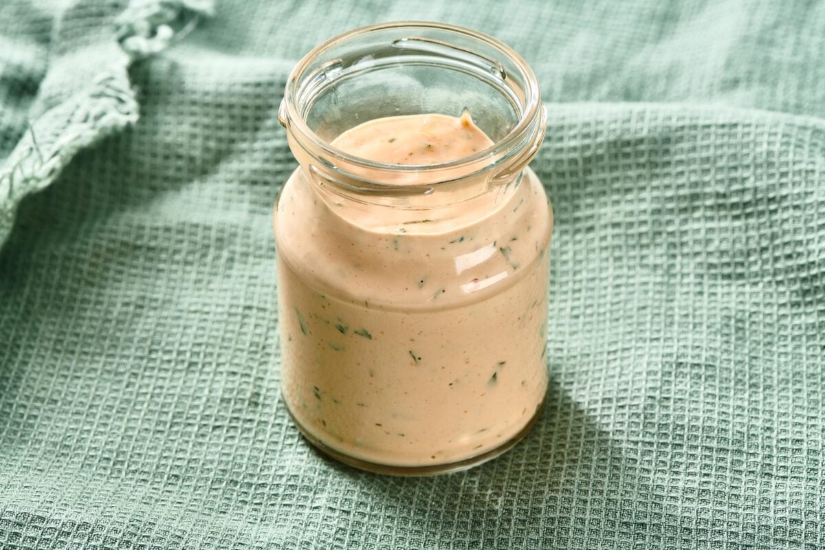 Small glass jar of Remoulade Sauce.