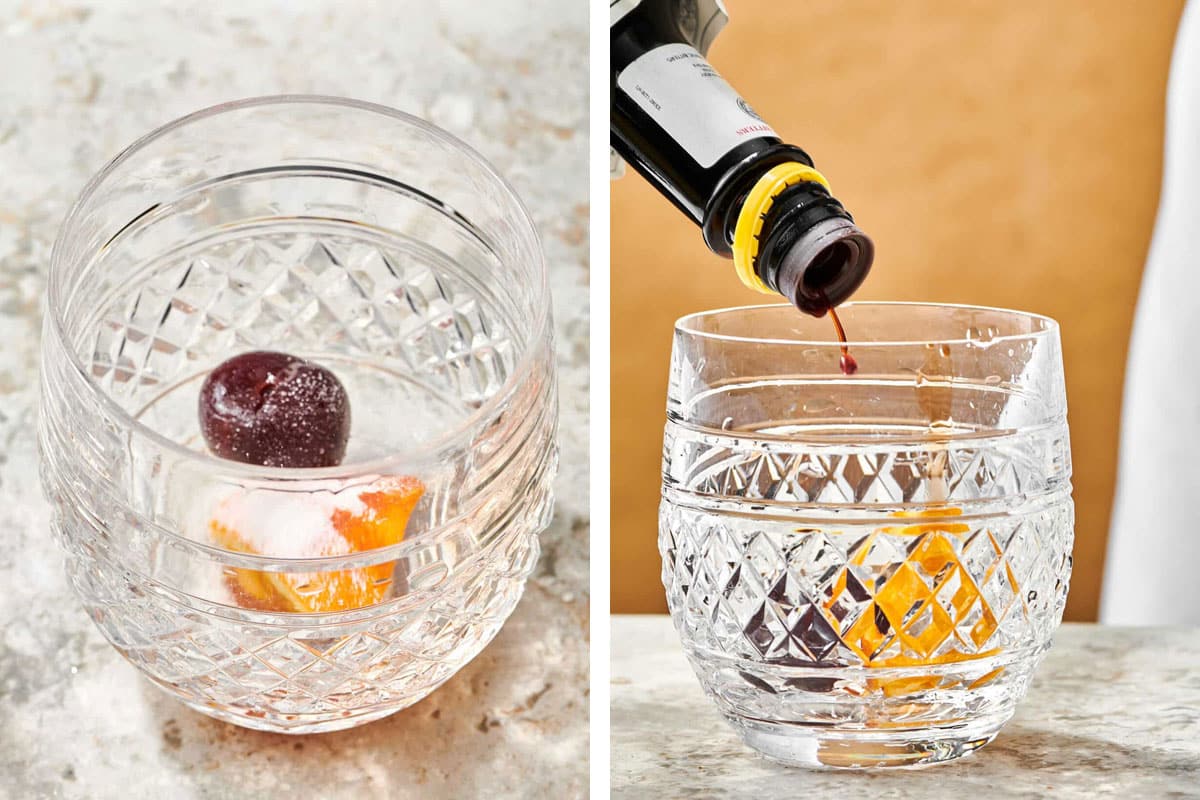 Adding cherry, orange, sugar, and bitters to rocks glass.