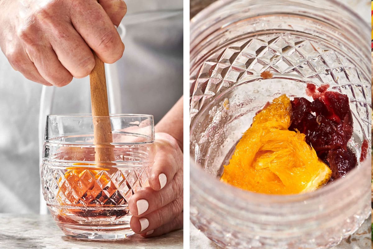 Muddling orange, cherry, sugar, and bitters for an Old-Fashioned Cocktail.