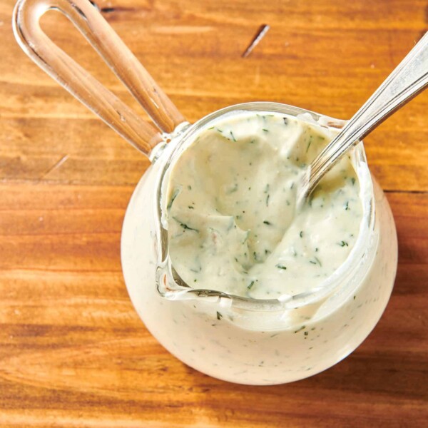 Small, handled glass serving cup of Dill Sauce.