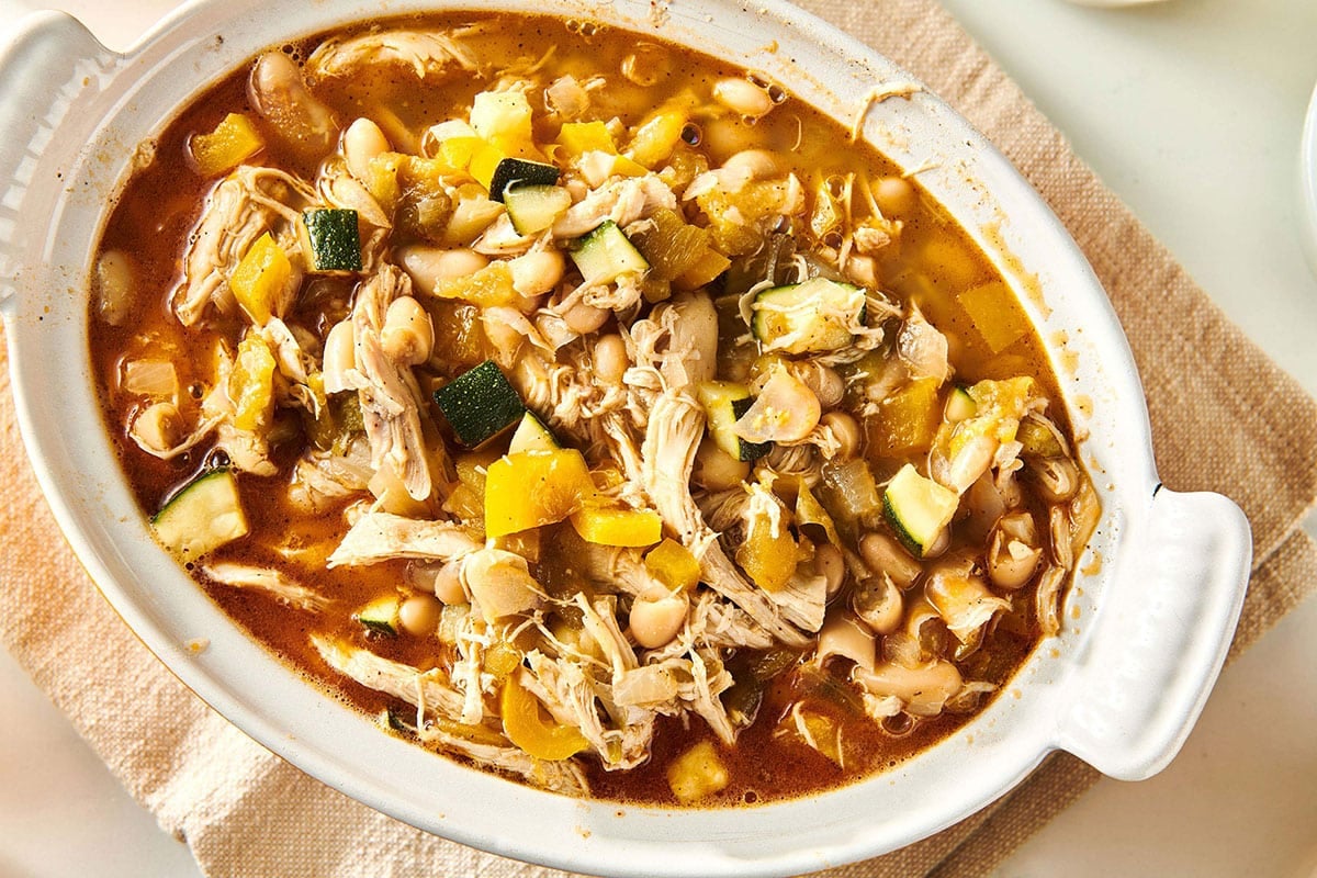 Hatch Chicken Chili in serving dish on table.