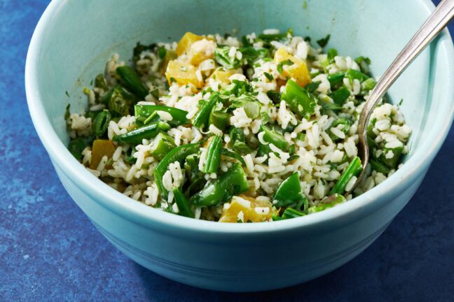Spring Vegetable and Rice Salad in a light blue bowl.