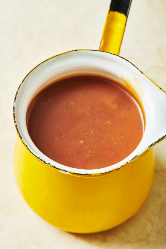 Caramel Sauce in a yellow pitcher.