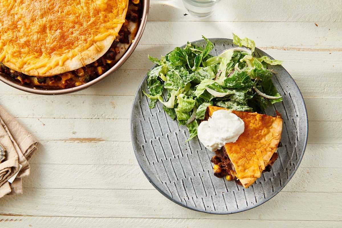 Plate with Vegetarian Mexican Lasagna and salad.