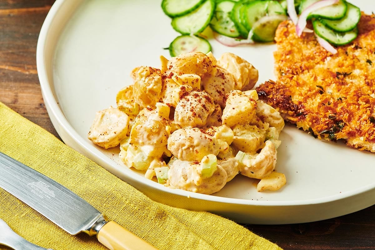 Deviled Egg Potato Salad on white plate.
