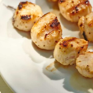 Scallops with grill marks.