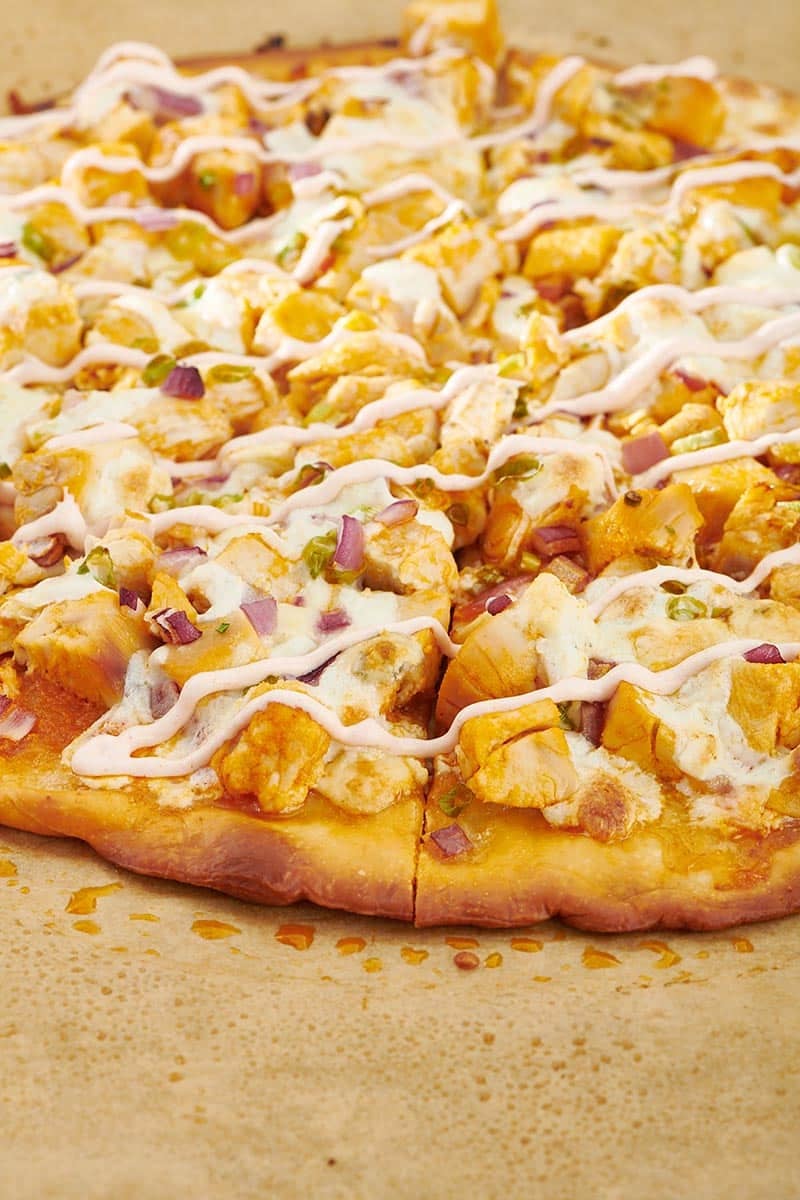 Buffalo Chicken Pizza on parchment paper.