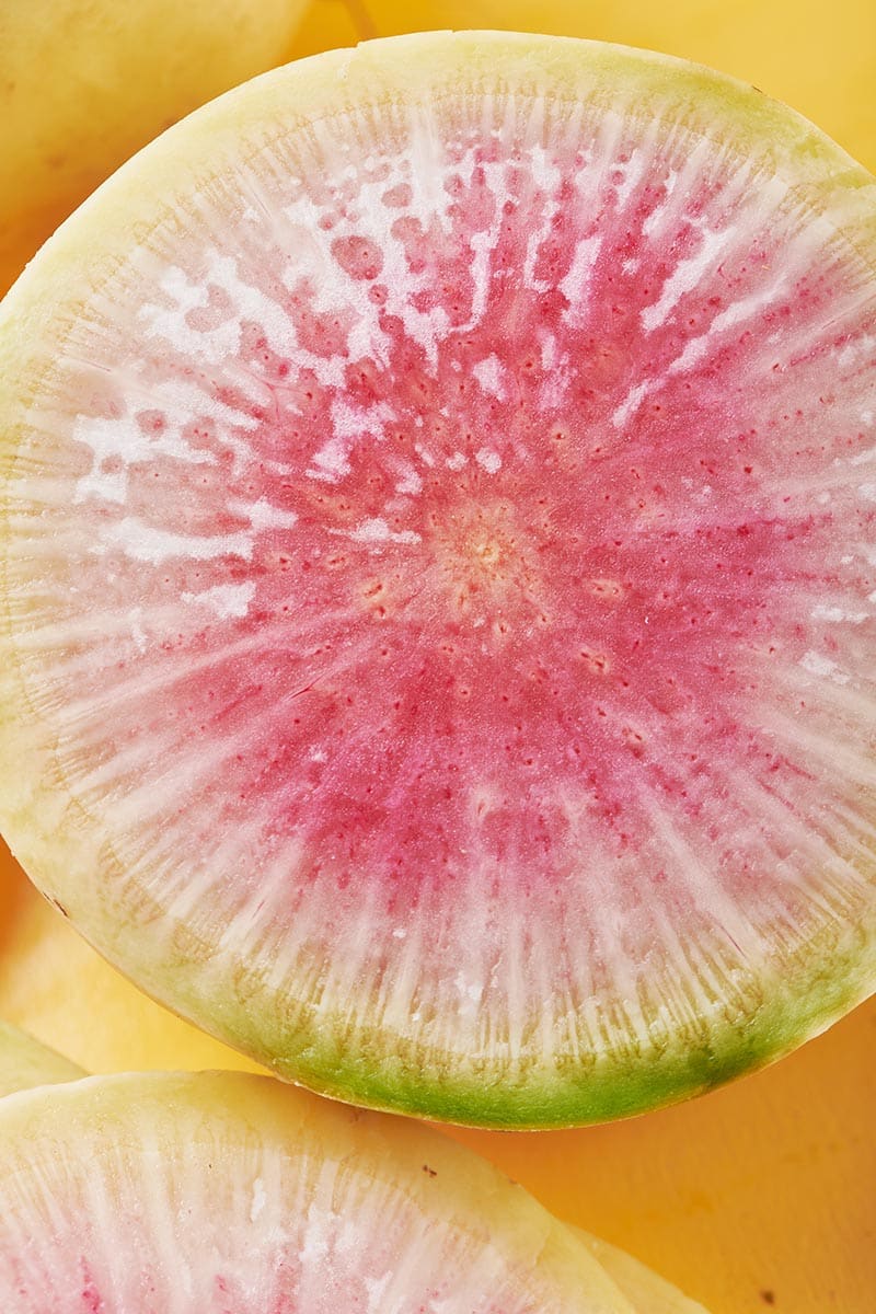 Inside of a cut fresh Watermelon Radish.