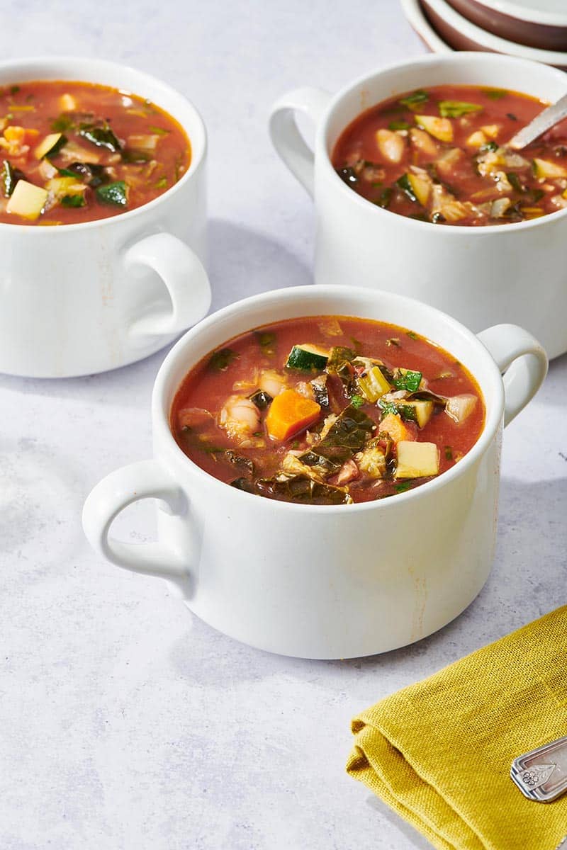 Minestrone Soup in bowls on table.