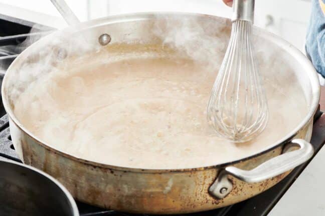 Whisk in a steaming skillet of white gravy.
