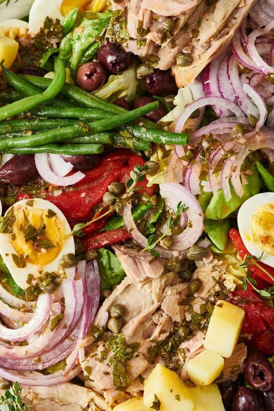 Nicoise Salad with tuna, red onion, eggs, and green beans