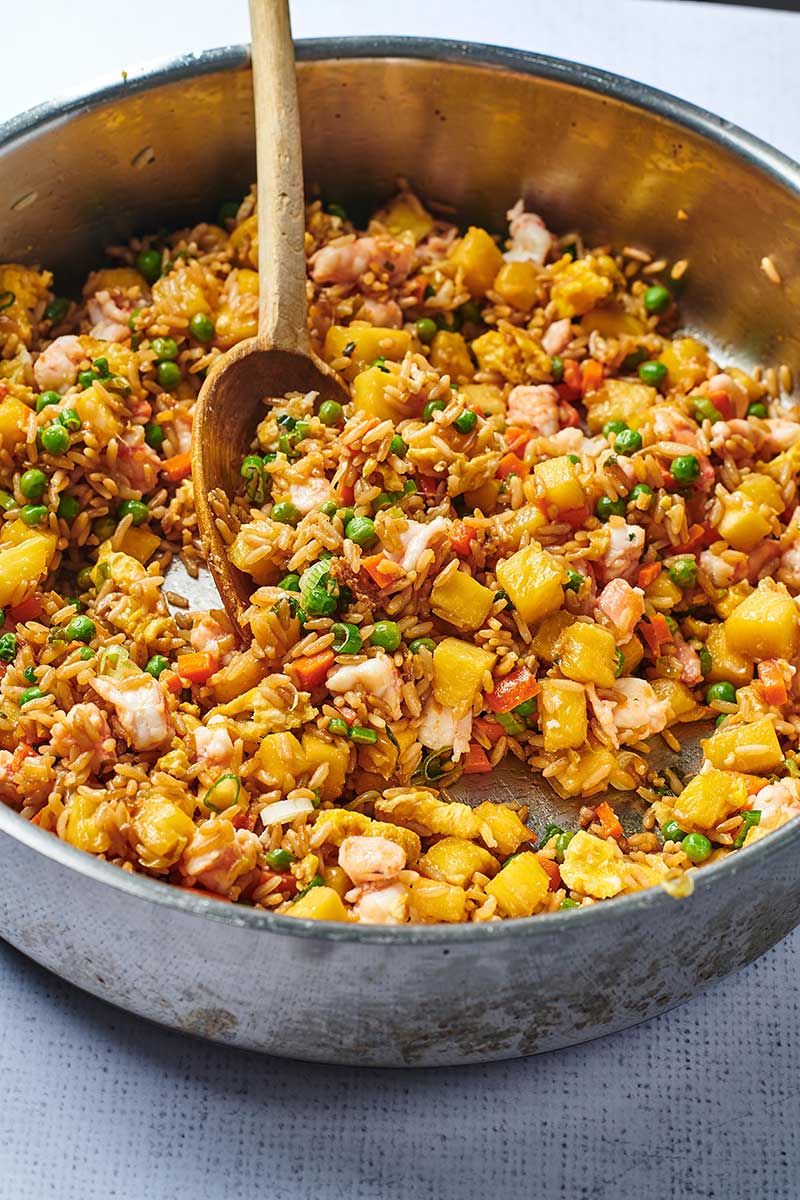 Pan of Pineapple Shrimp Fried Rice with spoon