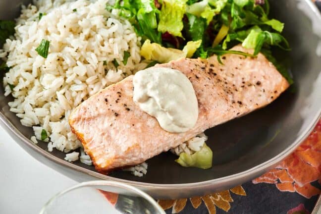 Salmon with Dill Sauce and rice in bowl