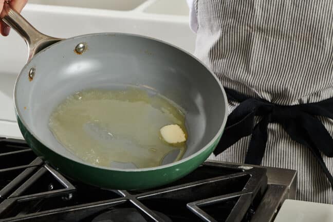 Melting butter in skillet for scrambled eggs