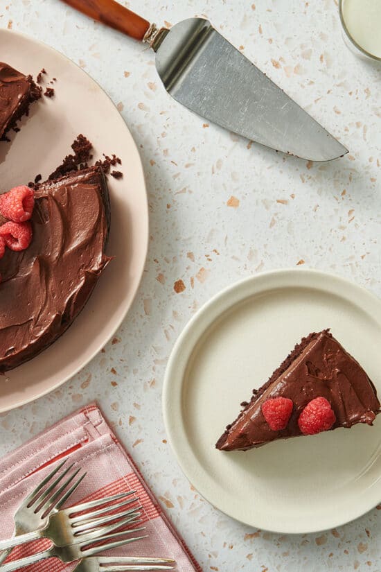 Slice of gluten-free chocolate cake with berries