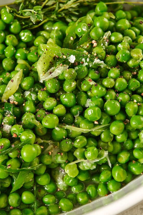 Cooked frozen peas in baking dish