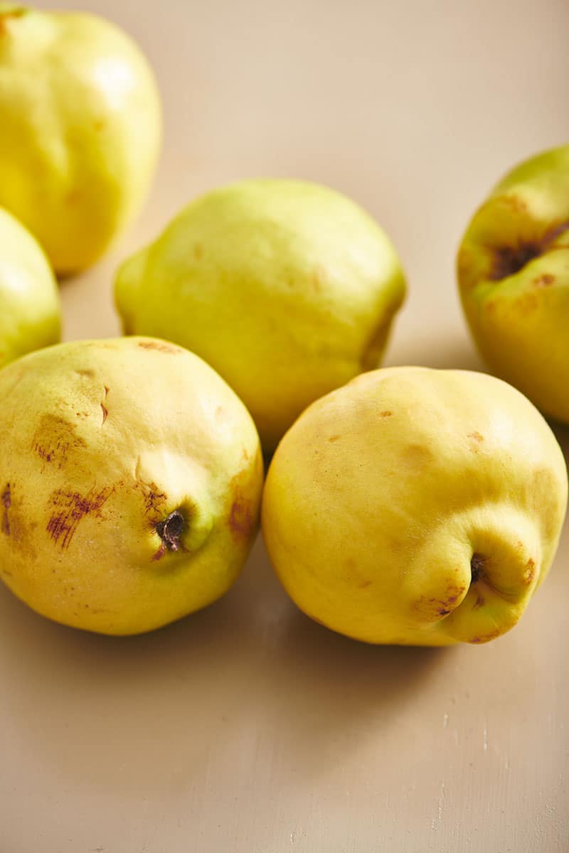 Fresh quince on table