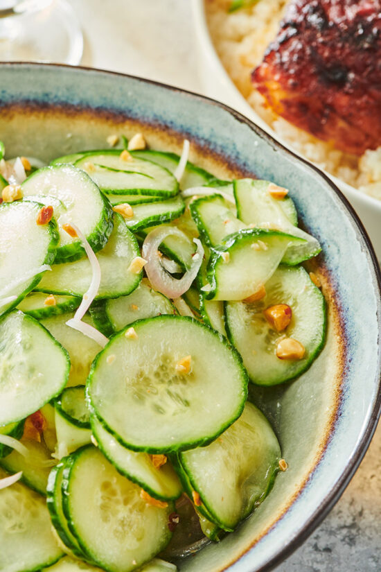 Vietnamese cucumber salad in white bowl on table