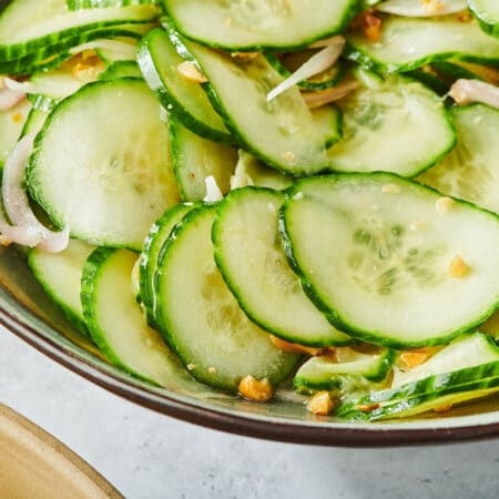 Vietnamese Cucumber Salad in serving bowl on marble tabletop