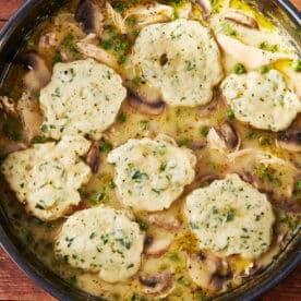 Chicken and Dumplings in large pot on table.