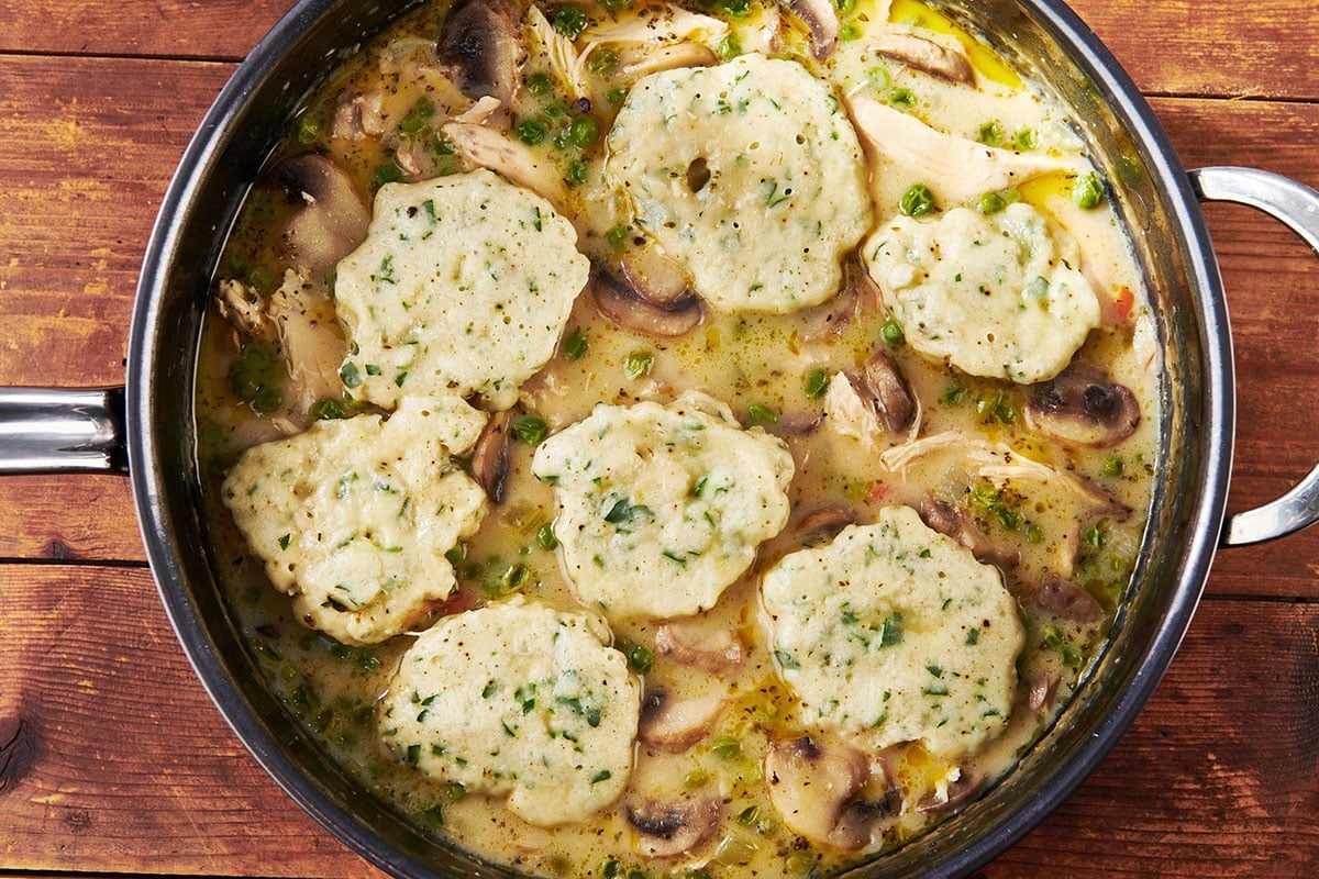 Chicken and Dumplings in large pot on table.