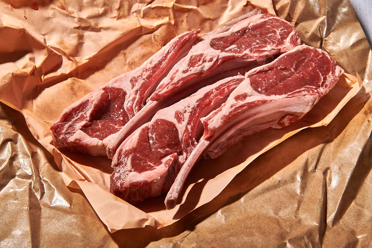 Fresh rib lamb chops on butcher paper.