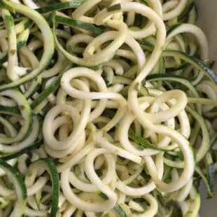 Zoodle salad in bowl made with zucchini "noodles."